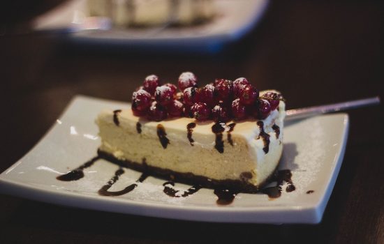 Cheesecake with raspberries or other berries.